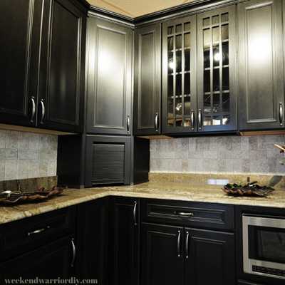 Dark colored kitchen cabinets